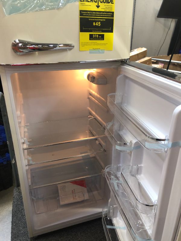 Photo 2 of FRIGIDAIRE EFR756-CREAM EFR756, 2 Door Apartment Size Retro Refrigerator with Top Freezer, Chrome Handles, 7.5 cu ft, Cream
