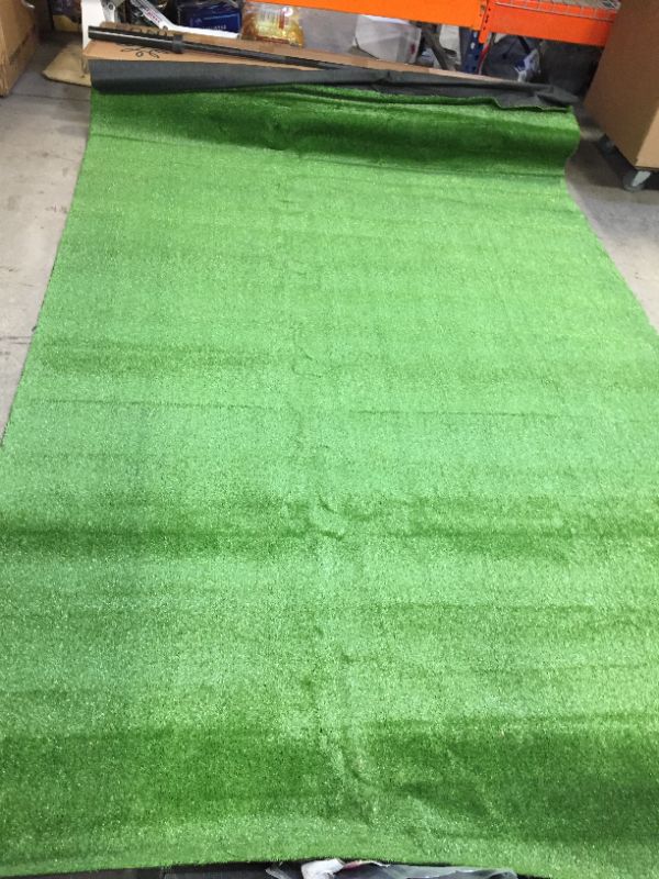 Photo 1 of 5 feet tall roll of misc faux grass 