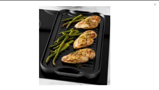 Photo 1 of AmazonBasics Pre-Seasoned Cast Iron Reversible Grill/Griddle, 20.0710.430.98, oil