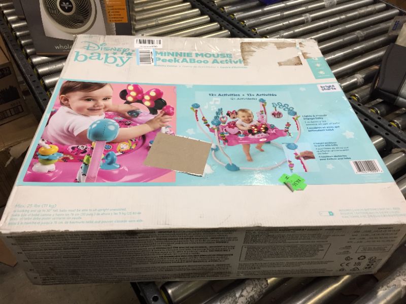 Photo 1 of Bright Starts Disney Baby Minnie Mouse PeekABoo Activity Jumper with Lights and Melodies, Ages 6 months +
