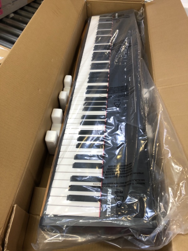 Photo 5 of Alesis Recital – 88 Key Digital Piano Keyboard with Semi Weighted Keys, 2x20W Speakers, 5 Voices, Split, Layer and Lesson Mode, FX and Piano Lessons
