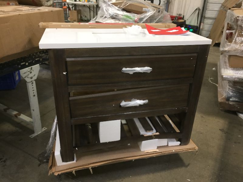 Photo 3 of 42inches x 22 inches wooden console-- selling for parts the counter top is in excellent shape made of some sort of stone --- TILE SLAT IN BOX IS BROKEN IN HALF ON ONE END, REAR BOTTOM/MID SUPPORT HAS CRACKS AS WELL. --- FOR PARTS OR IN NEED OF REPAIR.