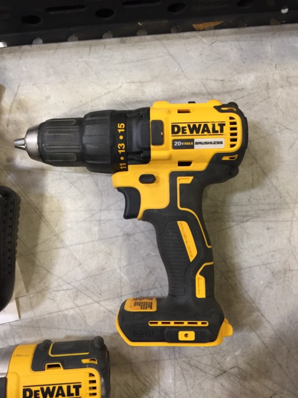 Photo 2 of 2 dewalt drills a battery charger and bag 