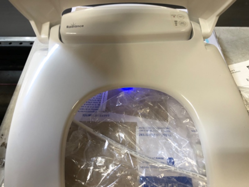 Photo 1 of BEMIS Radiance Heated Night Light Toilet Seat will Slow Close and Never Loosen, ROUND, Long Lasting Plastic, White, H900NL 000
