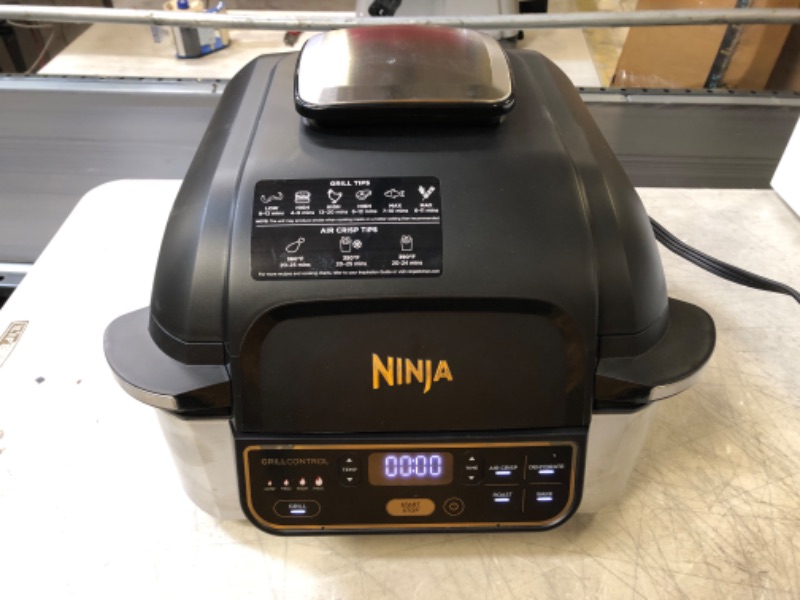 Photo 2 of Ninja AG301 Foodi 5-in-1 Indoor Grill with Air Fry, Roast, Bake & Dehydrate, Black/Silver
