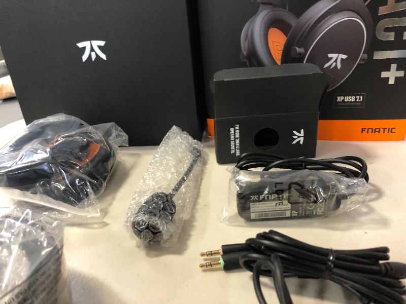 Photo 2 of Fnatic React Gaming Headset for Esports with 53mm Drivers, Metal Frame, Precise Stereo Sound, Broadcaster Detachable Microphone, 3.5mm Jack [PC, PS4, PS5, Xbox ONE, Xbox Series X] [Playstation_4] USED BUT LOOKS NEW, DAMAGES TO PACKAGING 
