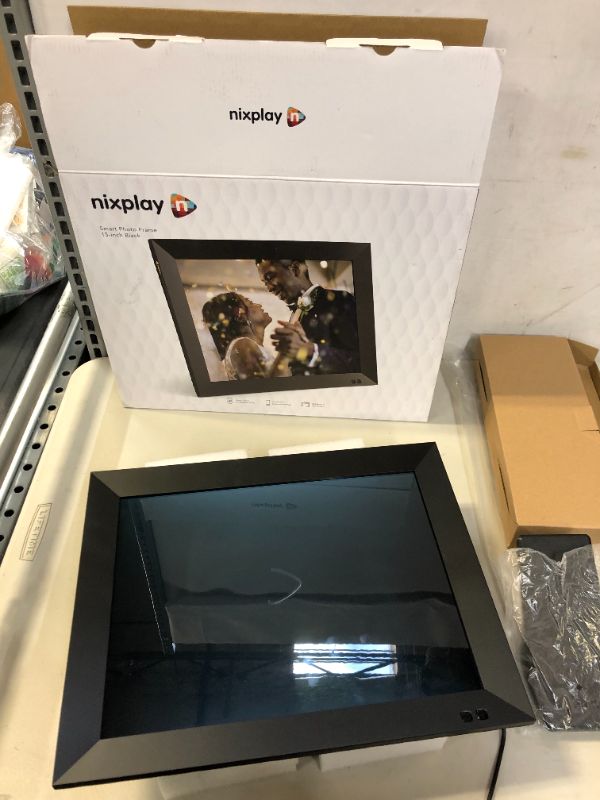 Photo 1 of NIXPLAY SMART PHOTO FRAME 15-INCH BLACK (PICTURES ON ITEM, USED BUT LOOKS NEW)