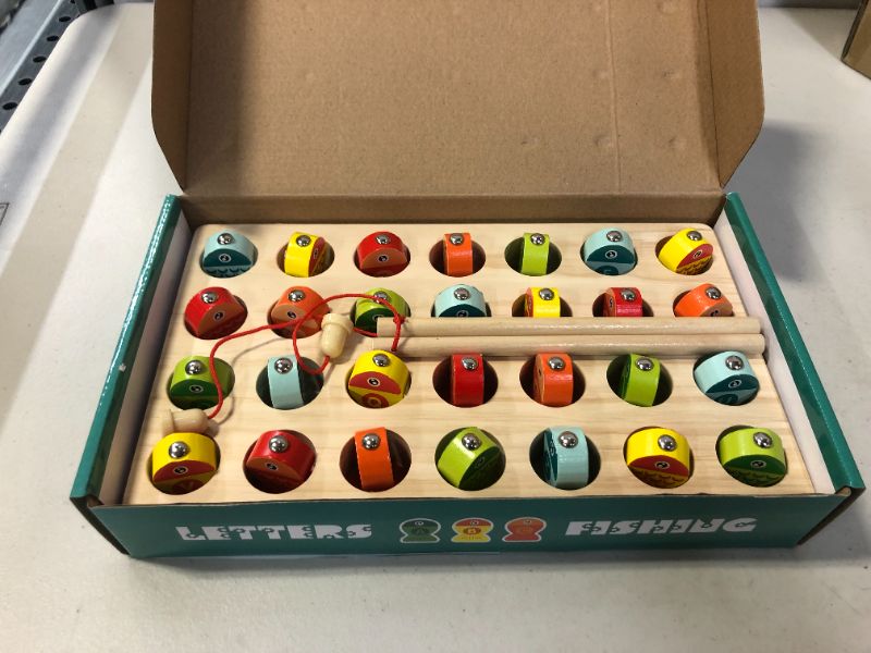 Photo 1 of Garlictoys Wooden Magnetic Fishing Game Fine Motor Skill Toy ABC Alphabet Color Sorting Puzzle ,Montessori Letters Cognition Preschool Education Gift for 3+Years Old Toddler Kid.
