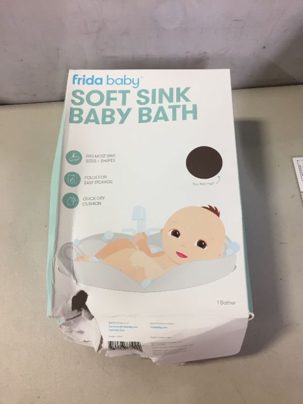 Photo 1 of Soft Sink Baby Bath by Frida Baby Easy to Clean Baby Bathtub + Bath Cushion That Supports Baby's Head
