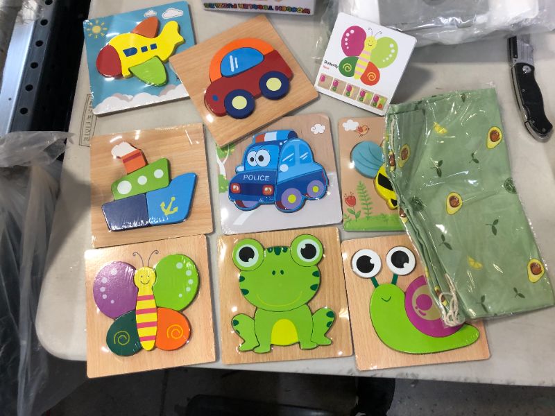 Photo 1 of Mkpkic Wooden Jigsaw Puzzles Gifts Toys for Toddler 3+ Years Old Boys Girls Infant Kids Learning Educational Toys 8 Pack Animal Vehicle Shape Montessori Toys Christmas Birthday Gifts
