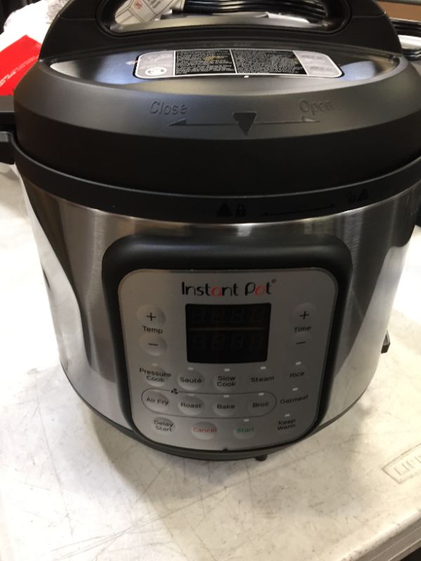 Photo 2 of Instant Pot Duo Crisp 9-in-1 Electric Pressure Cooker with Air Fryer Lid and Sealing Ring, Stainless Steel, Pressure Cook, Slow Cook, Air Fry, Roast, Steam, Sauté, Bake, Broil and Keep Warm
