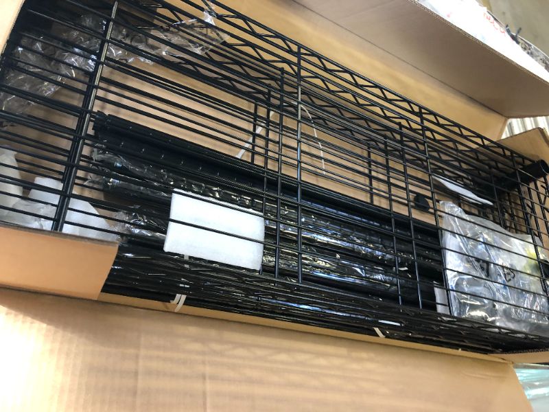 Photo 3 of Amazon Basics 4-Shelf Adjustable, Heavy Duty Storage Shelving Unit (350 lbs loading capacity per shelf), Steel Organizer Wire Rack, Black (36L x 14W x 54H)
