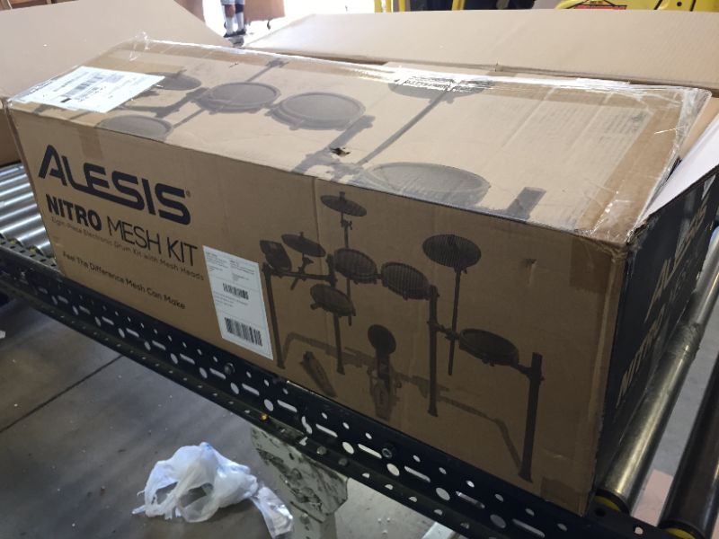 Photo 2 of Alesis Drums Nitro Mesh Kit - Electric Drum Set with USB MIDI Connectivity, Mesh Drum Pads, Kick Pedal and Rubber Kick Drum, 40 Kits and 385 Sounds
---- COMPLETE-----OPEN BOX BUT NEW ---