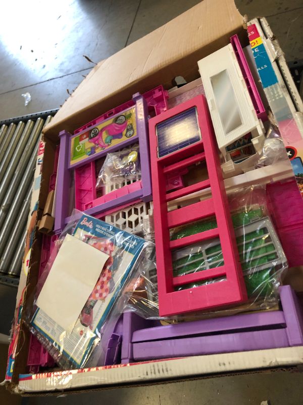 Photo 3 of Barbie Dreamhouse Dollhouse with Wheelchair Accessible Elevator, Pool, Slide and 70 Accessories Including Furniture and Household Items, Gift for 3 to 7 Year Olds
