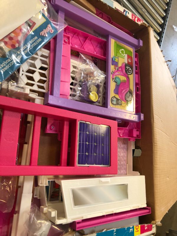 Photo 5 of Barbie Dreamhouse Dollhouse with Wheelchair Accessible Elevator, Pool, Slide and 70 Accessories Including Furniture and Household Items, Gift for 3 to 7 Year Olds
