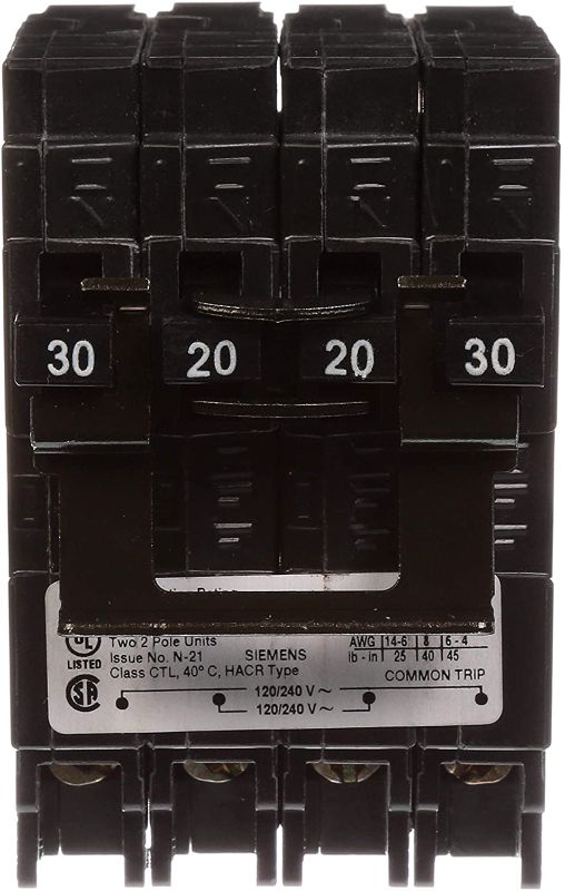 Photo 2 of 2 Quadplex Two Double Pole 30 Amp Outside Two Double Pole 20 Amp Inside Circuit Breaker
