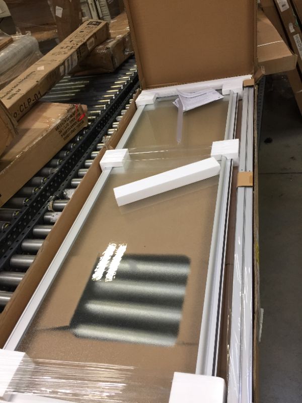 Photo 1 of 24 in. x 64 in. Framed Pivot Shower Door Kit in Silver with Pebbled Glass
