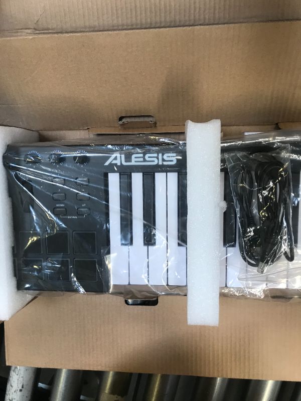 Photo 3 of Alesis V49 - 49 Key USB MIDI Keyboard Controller with 8 Backlit Pads, 4 Assignable Knobs and Buttons, Plus a Professional Software Suite Included
