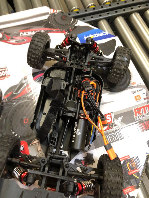 Photo 6 of ARRMA RC Car 1/8 Typhon 6S V5 4WD BLX Buggy with Spektrum Firma RTR (Ready-to-Run), Black and Red, ARA8606V5
