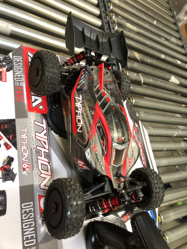 Photo 10 of ARRMA RC Car 1/8 Typhon 6S V5 4WD BLX Buggy with Spektrum Firma RTR (Ready-to-Run), Black and Red, ARA8606V5
