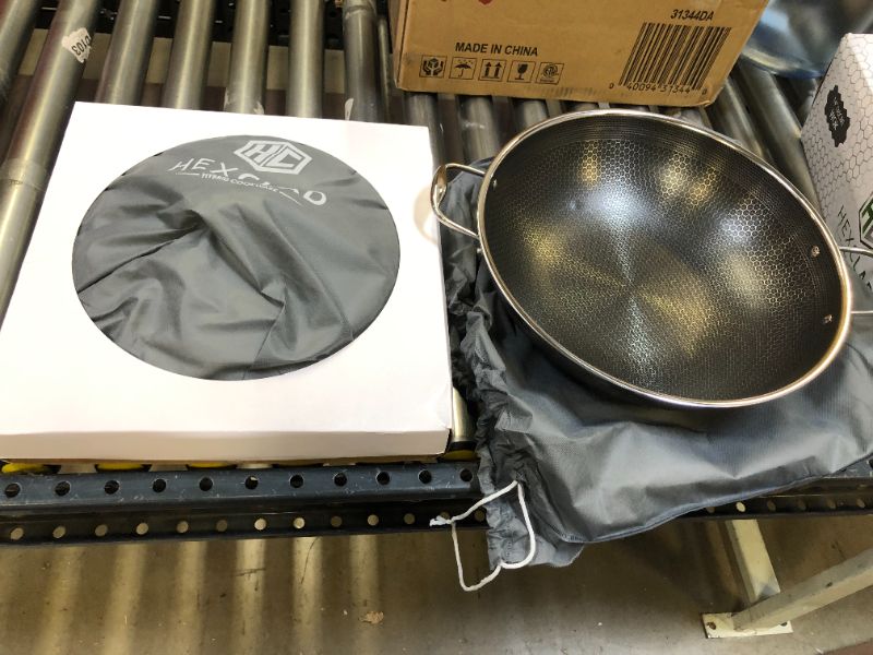 Photo 2 of HexClad 14 Inch Hybrid Stainless Steel Wok Pan with Stay-Cool Handle - PFOA Free, Dishwasher and Oven Safe, Works with Induction, Ceramic, Non Stick, Electric, and Gas Cooktops