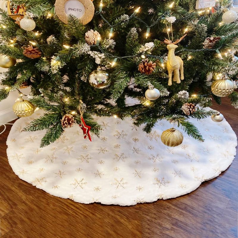 Photo 1 of iflove Soft Plush Christmas Tree Skirt with Golden Snowflakes, White Faux Fur Tree Skirt 48 Inch for Holiday Party Christmas Tree Decorations Ornaments
