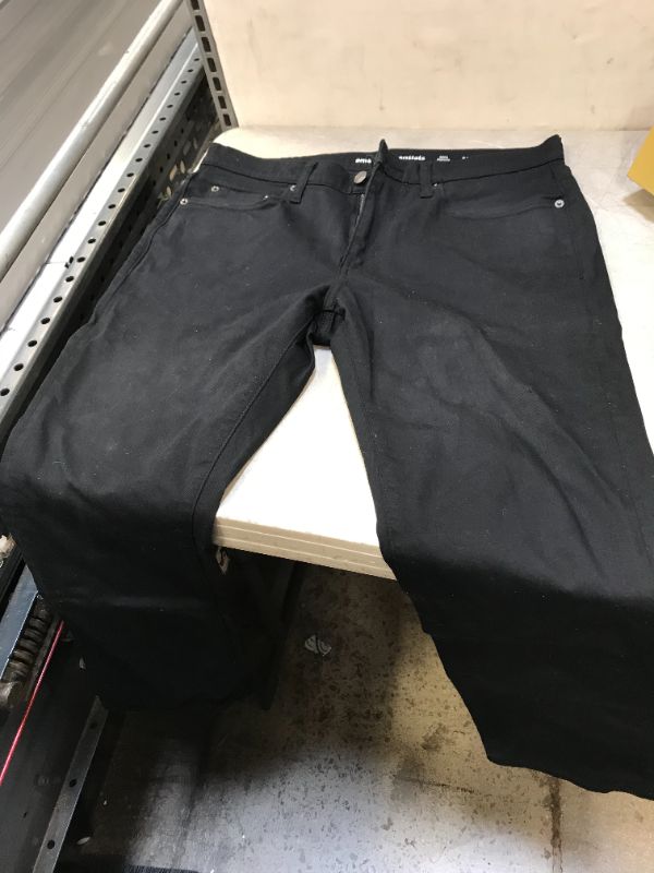 Photo 1 of Amazon essential black men's jeans size 32 W X 30 L slim mince 