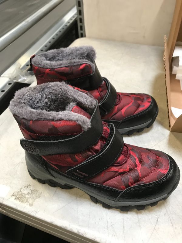 Photo 2 of kids snow boots ( size unknown ) 