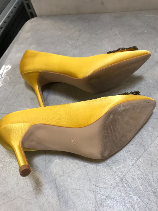Photo 1 of womens size 6.5 yellow heel 
