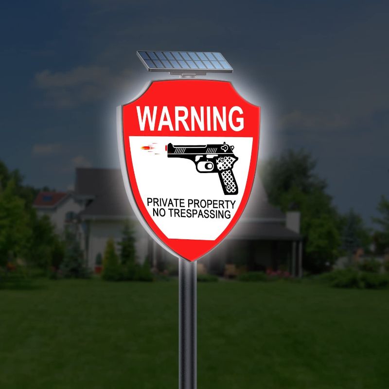 Photo 1 of BNT Solar No Trespassing Sign, Outdoor Wall-Mounted Gun Warning Sign with Stake, Gun Accessories Gun Safety for Yard, Street, House, Garden (1 Pack)
