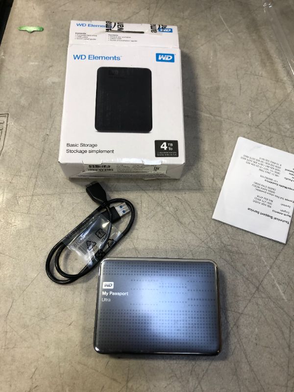 Photo 2 of WD 4TB Elements Portable USB 3.0 External Hard Drive ( box is damaged but item is new ) 