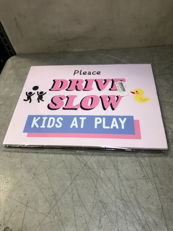 Photo 1 of "Please drive slow kids at play " pink and blue yard sign 