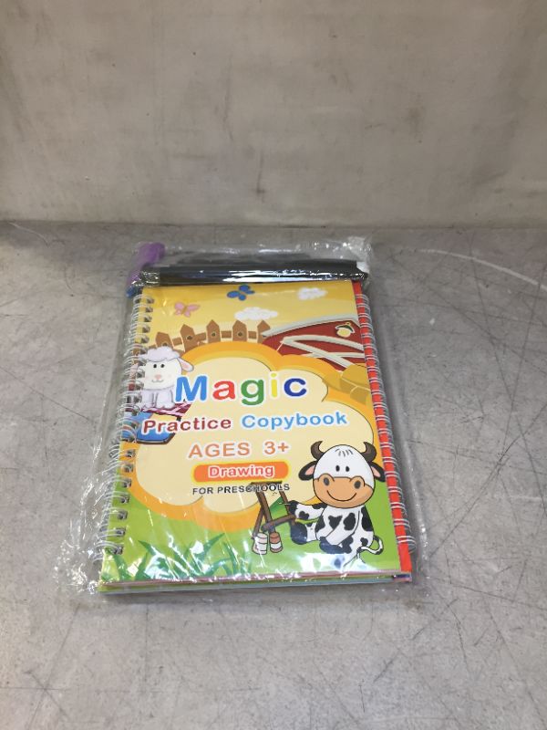 Photo 2 of 4Pcs Magic Practice Copybook for Kids Reusable Magical Handwriting Copybooks Set Template Design Calligraphy Copybook Workbook with Magical Pen Alphabet Number Drawing Math(4 Books with Pens)
