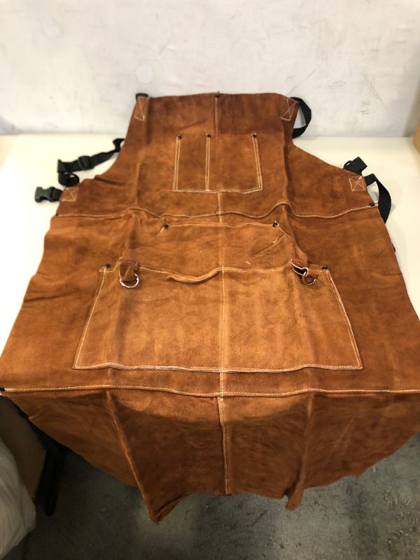 Photo 2 of New eletecpro Length 42" 6 Pockets Leather Welding Apron & Welding Gloves Cowhide Fire/Heat Resistant Shop Apron Men/Women(Brown) by eletecpro
