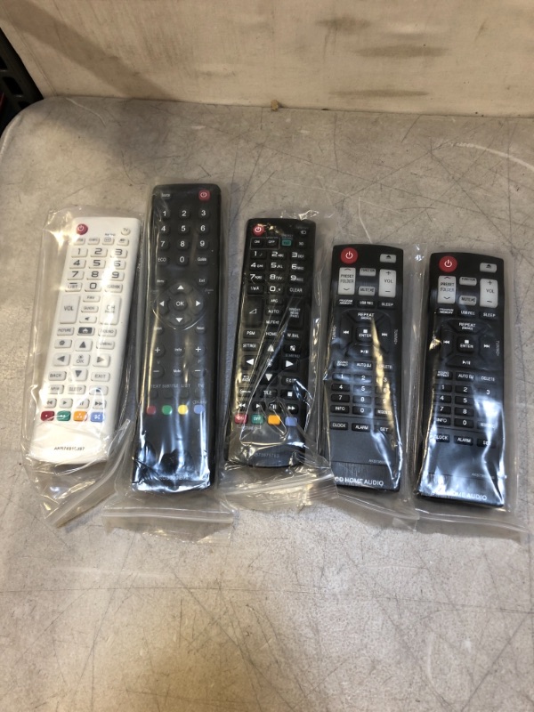 Photo 1 of VARIOUS REMOTES - VARIOUS MODELS   - 5 PACK - SOLD AS IS 