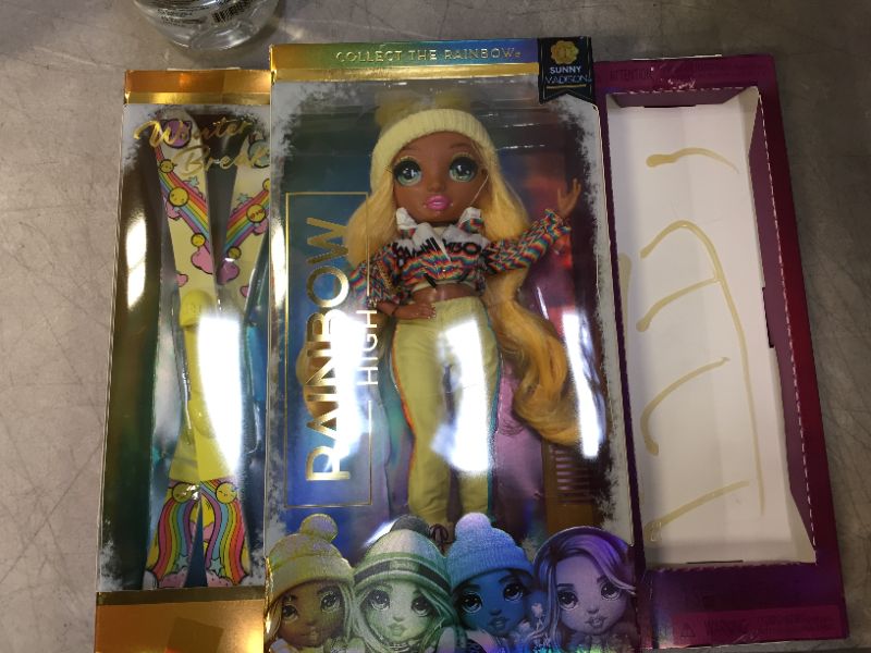 Photo 2 of Rainbow High Winter Break Sunny Madison – Yellow Fashion Doll and Playset with 2 Designer Outfits, Pair of Skis & Accessories