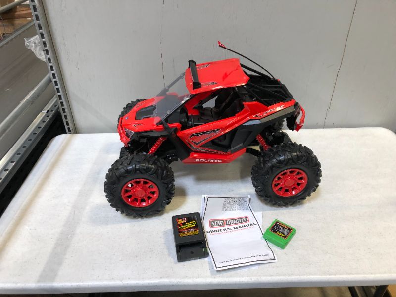 Photo 1 of New Bright RC 1:5 Scale Remote Control Polaris RZR XP PRO ATV 2.4GHz 12.8V (missing remote)