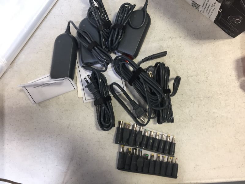 Photo 2 of onn. 65W Universal Laptop Charger with 10 Interchangeable Tips, Total 10 Feet Power Cords, Fits Most Laptops Like HP, Dell, Lenovo, onn. 3 PK 
