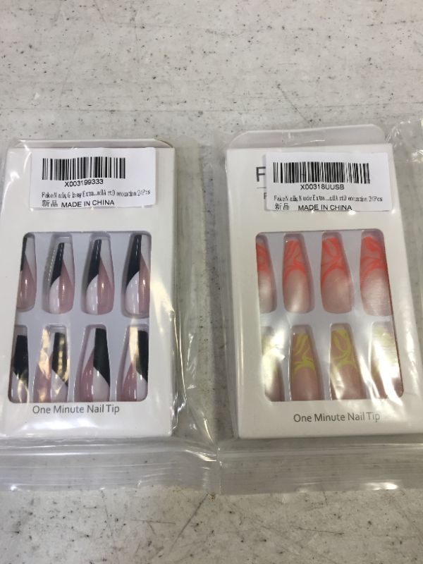 Photo 1 of 2 packs of fake nails