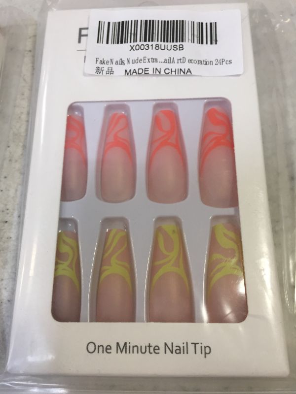 Photo 2 of 2 packs of fake nails