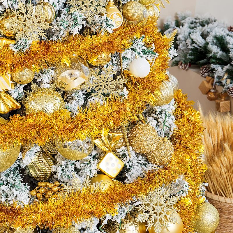 Photo 1 of 33Ft Christmas Tinsel Garland for Tree Tinsel Twist Garland Sparkly Streamer Hanging Holiday Tinsel Xmas Tree Decorations Wedding Party Supplies Indoor Outdoor Home Ornaments(Gold)

