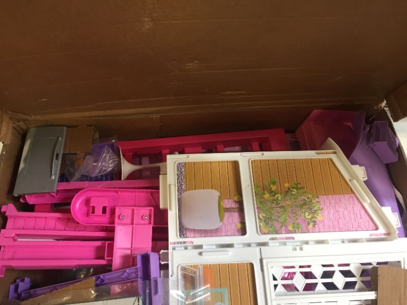 Photo 2 of Barbie Dreamhouse Dollhouse with Wheelchair Accessible Elevator, Pool, Slide and 70 Accessories Including Furniture and Household Items, Gift for 3 to 7 Year Olds
