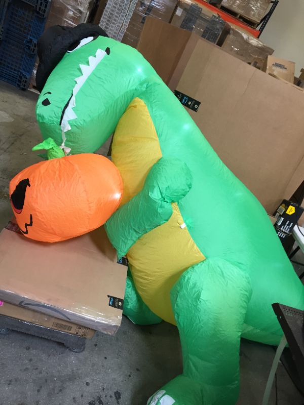 Photo 1 of 6ft Halloween Inflatable Witch Dinosaur with Pumpkin Decor