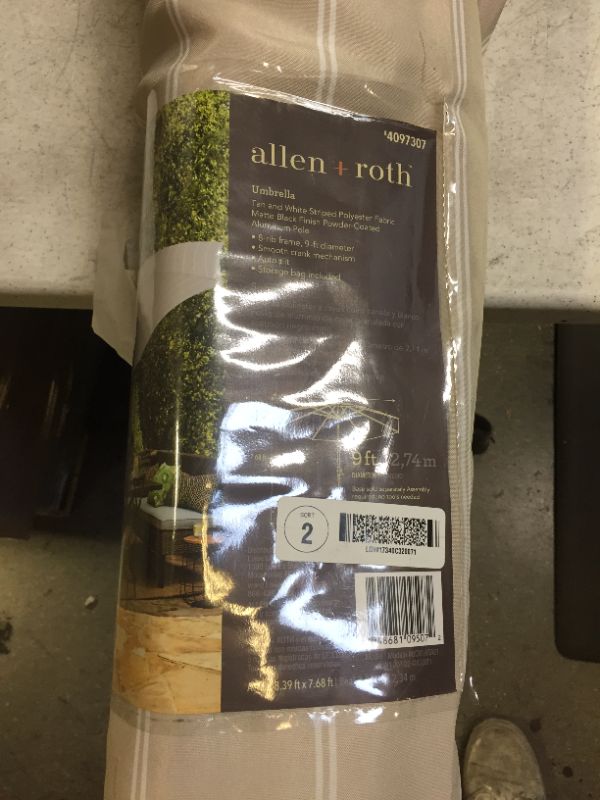 Photo 4 of allen + roth 9-ft Tan Striped Auto-tilt Market Patio Umbrella
used - may be missing parts