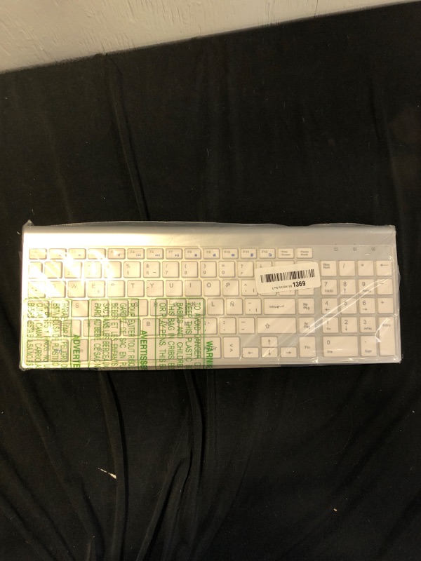 Photo 1 of white and grey generic keyboard 