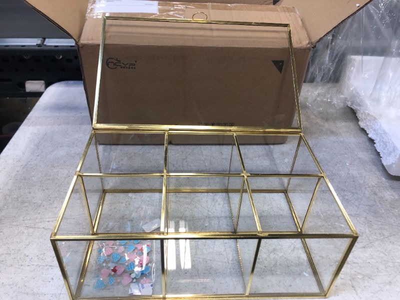 Photo 1 of 11.5 inches long x 7 inches wide and 5 inches high jewelry box glass and gold lining 