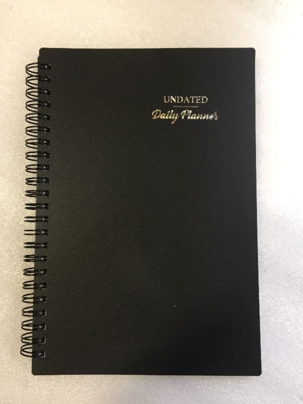 Photo 2 of 2 undated planners-- new in the package 