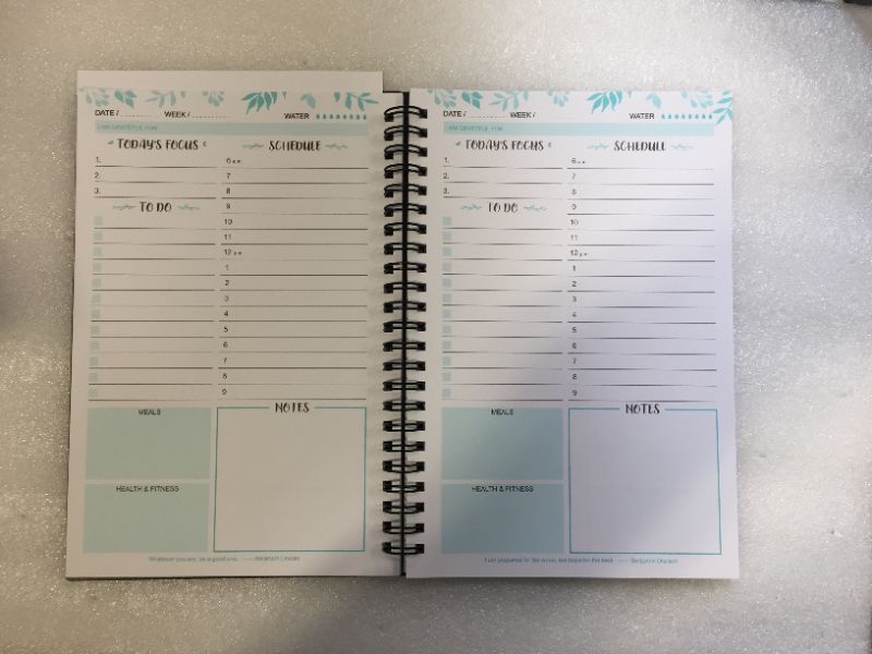 Photo 2 of 2 undated planner-- new 
