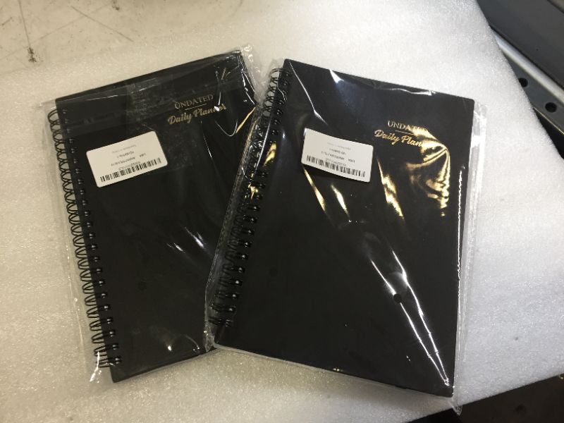 Photo 1 of 2 undated planners-- new 
