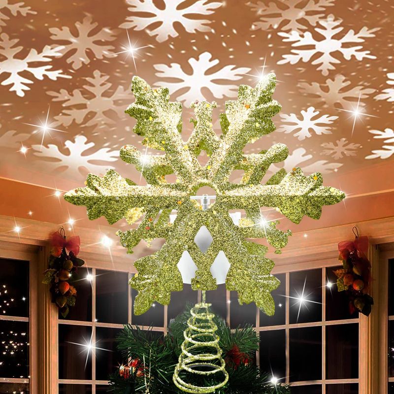 Photo 1 of Christmas Tree Topper with 3D Snowflake Projector Lights, 11.6" Snowflake Tree Topper Light Decorations, Indoor Outdoor Fantastic Rotating Projector Lights for New Year Holiday Christmas Tree (Gold)
